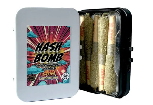 Two tins of premium infused mini-cones featuring concentrate, premium flower and filtered kief. sativa and indica varieties shown availability varies